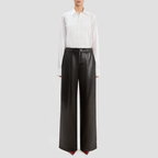 Full-length denim jeans with red zipper closure
