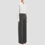 Solid color casual trousers with zippered slits