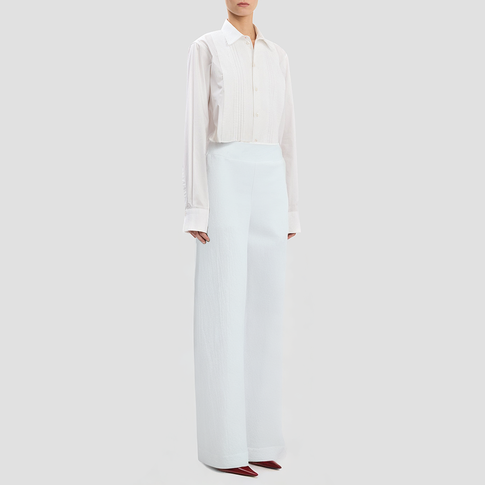 Black straight-leg trousers with a zipper