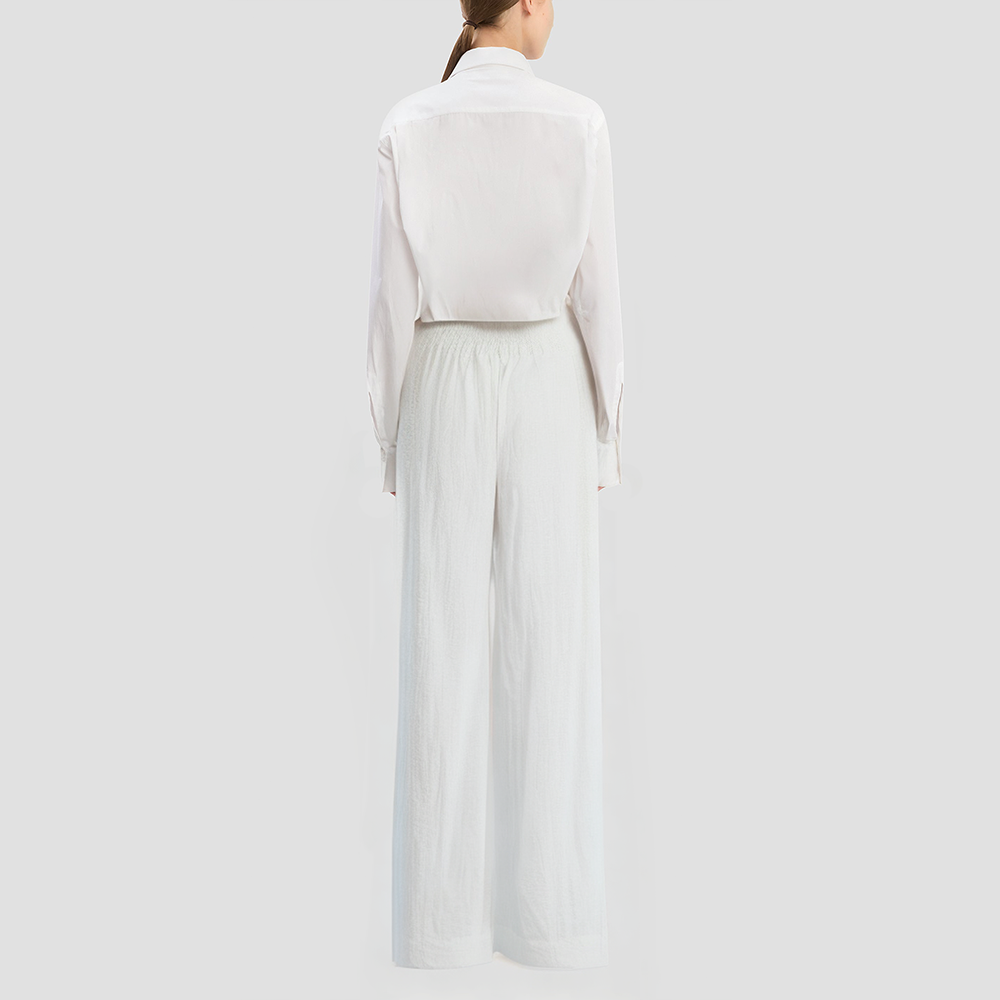 Black straight-leg trousers with a zipper