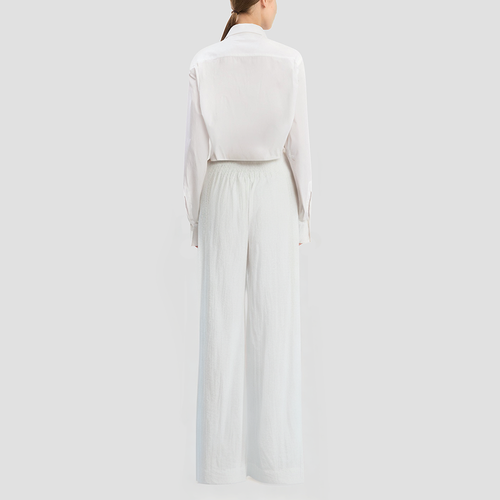 Black straight-leg trousers with a zipper